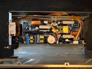 An Arduino Nano without header pins can be tucked into the side of a rev. A/Emerson-made ICX power supply. "A picture of an exposed revision A power supply for an ICX switch, with a fan replaced, and an Arduino wired in to spoof the original fan's speed.